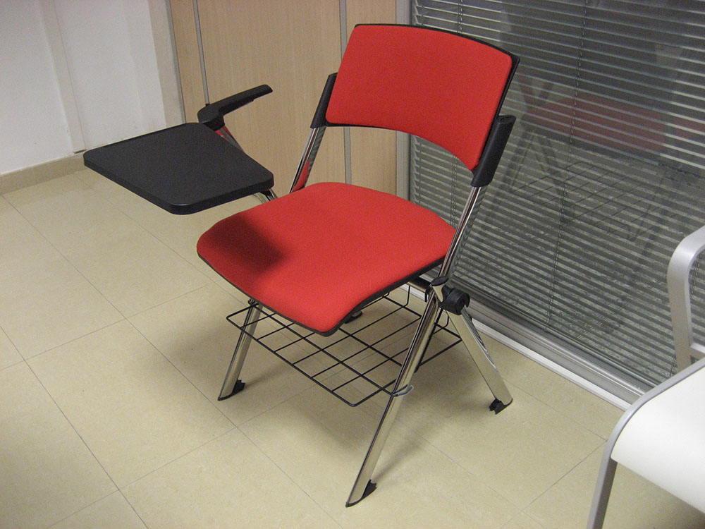 Folding chair with writing tablet